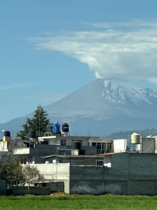 Snow-capped volcanic peaks observed in San Rafael Tlanalapan landscape