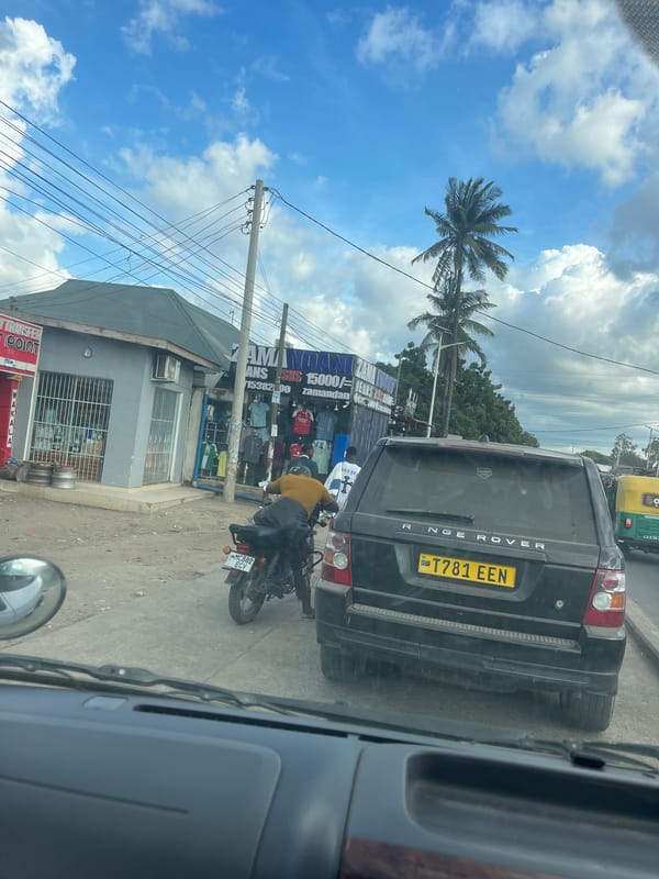 Range Rover, motorcyclist spotted on Dar es Salaam street