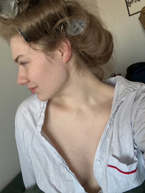 Woman with hair rollers rests in Kazan