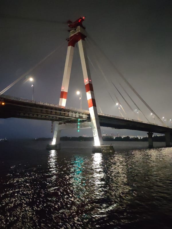 October Bridge illuminated at night in Cherepovets, Russia