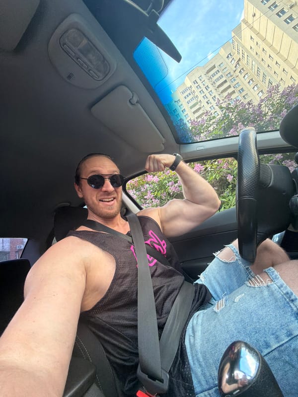 Man photographed smiling in driver's seat, Saint Petersburg