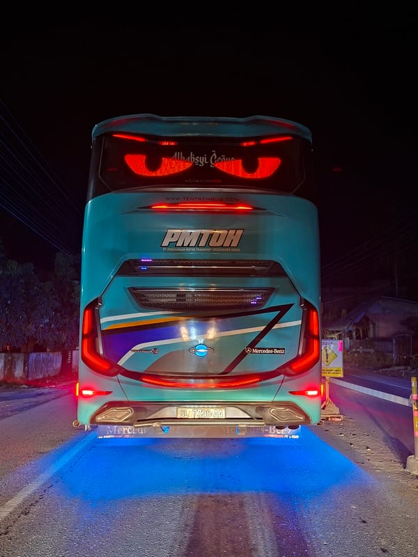 PMTOH bus observed at night in Lhokseumawe, Indonesia