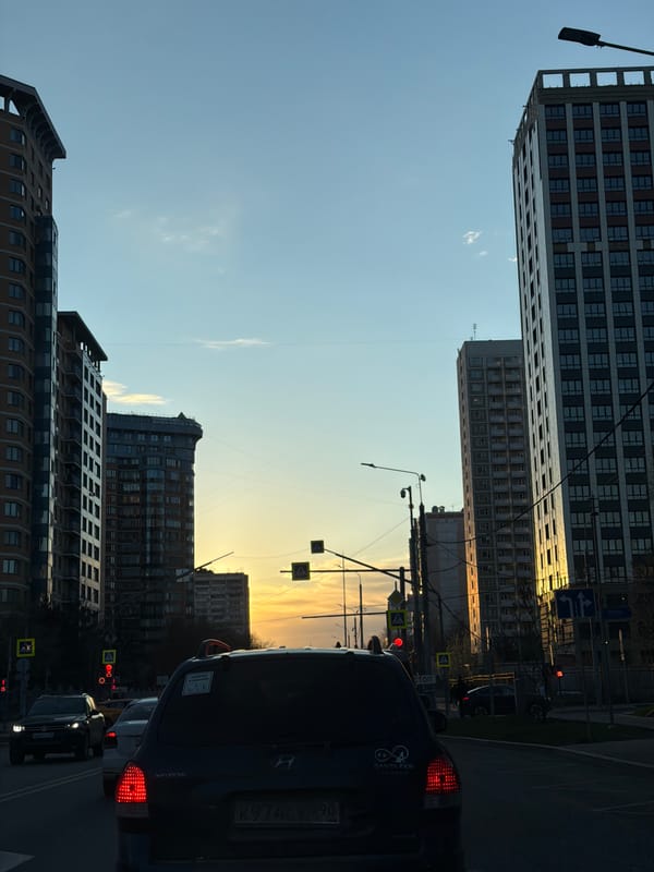 Moscow street scene captured from vehicle at dusk