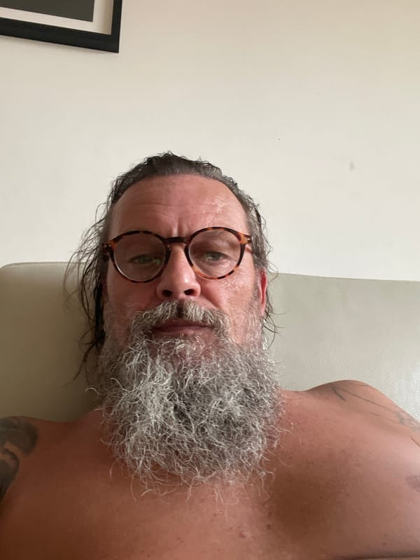 Shirtless selfie and couch shot in Netanya, Israel