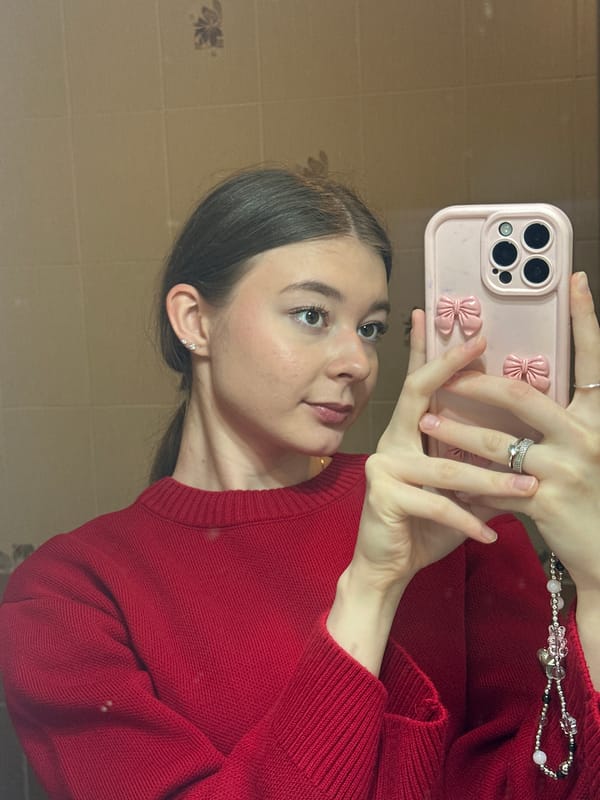 Young woman documents personal belongings, takes selfies in Kazan home