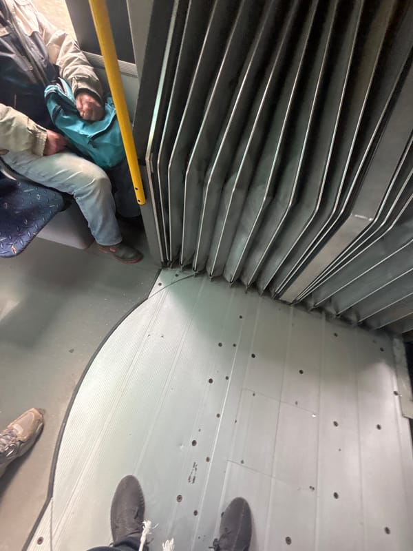 Passenger sleeps under luggage rack on Burgas bus