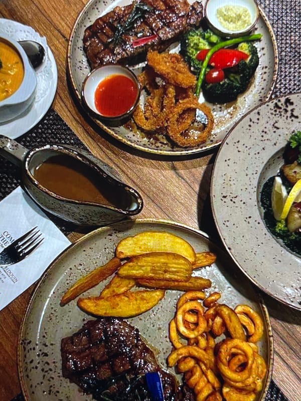 Dinner and drinks at a wildly decorated rustic bar-restaurant