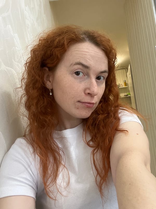 Woman takes selfies indoors in Chaikovsky, Russia