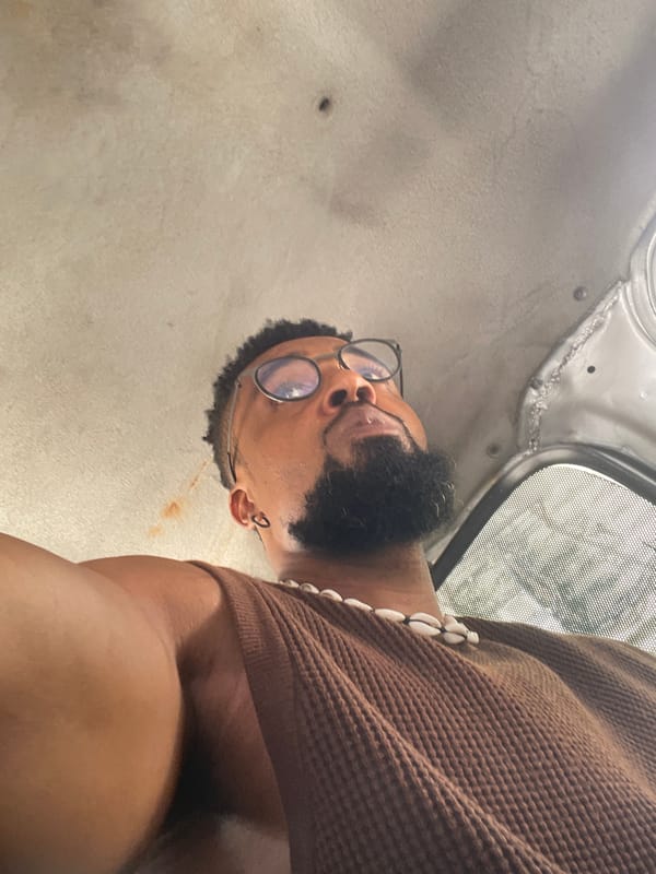 Young men captured in casual moments across Lagos streets