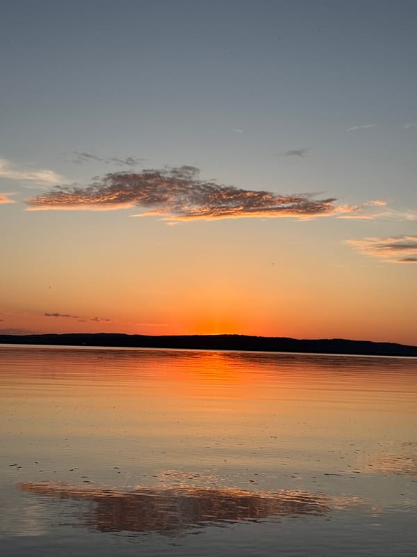 Sunset gathering documented at Chaikovsky waterfront, Russia