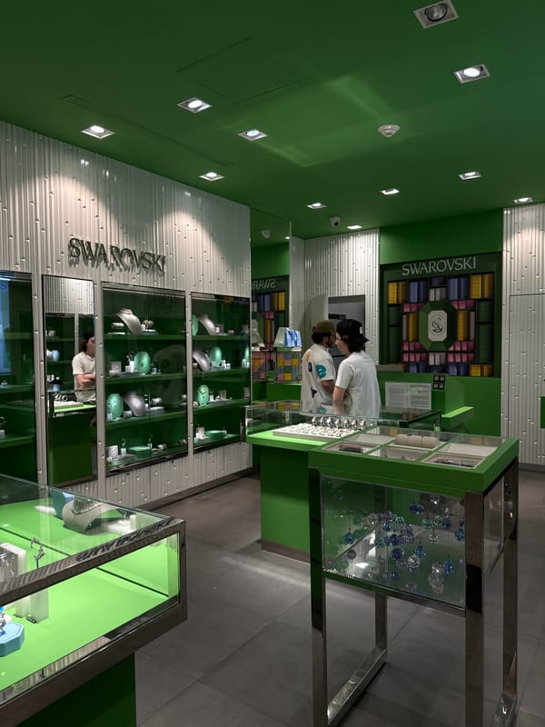 Customers browse jewelry at Swarovski store in Huixquilucan