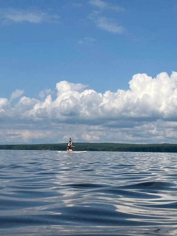Summer morning on the Kama River: paddleboards, swimmers, and shoreside scenes