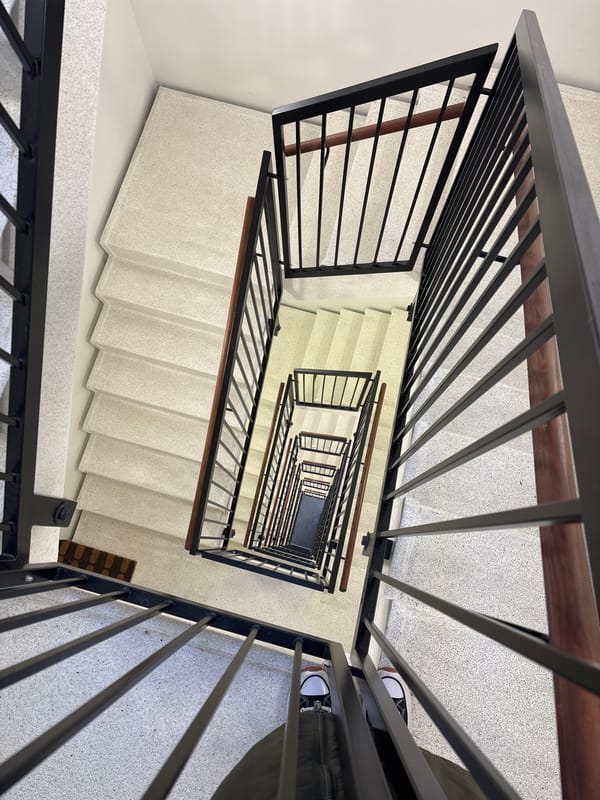 Spiral staircase photographed from above in Copenhagen building