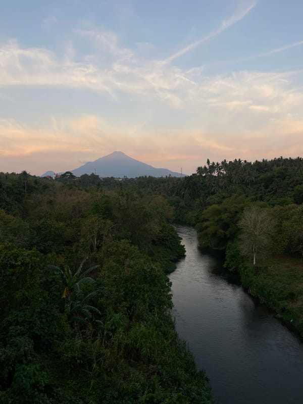 River, mountain, and road at golden hour in Maumbi