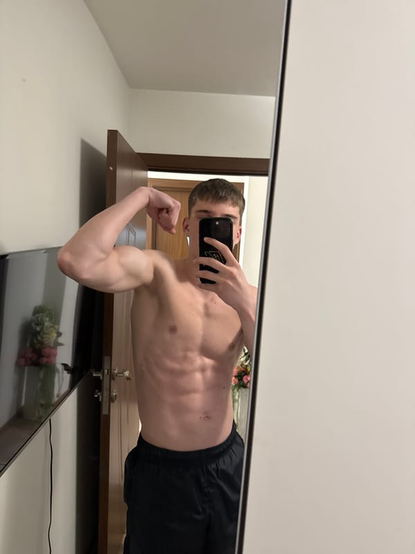 Man takes mirror selfie indoors in Varna, Bulgaria