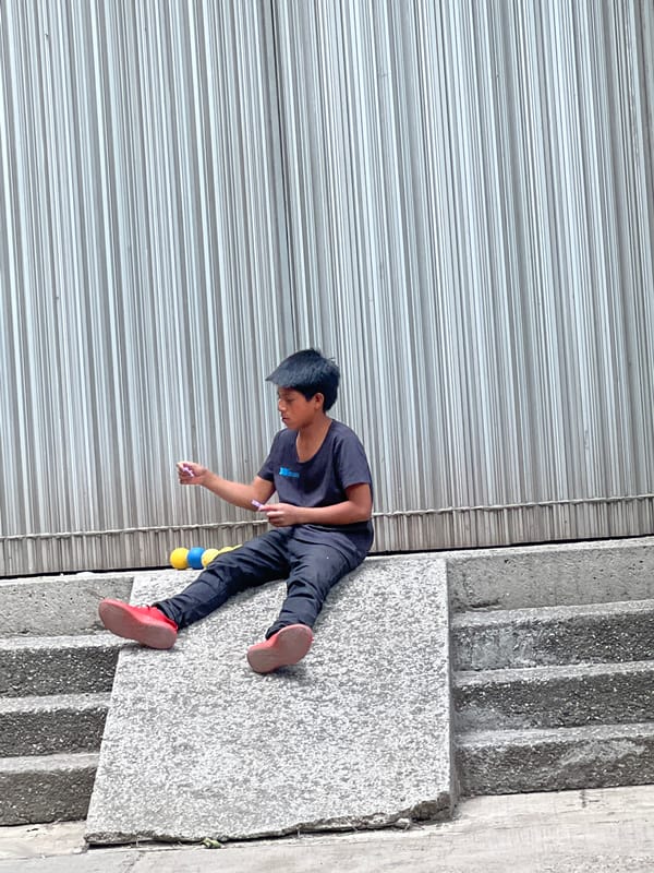Child spotted on concrete structure in Mexico City urban area