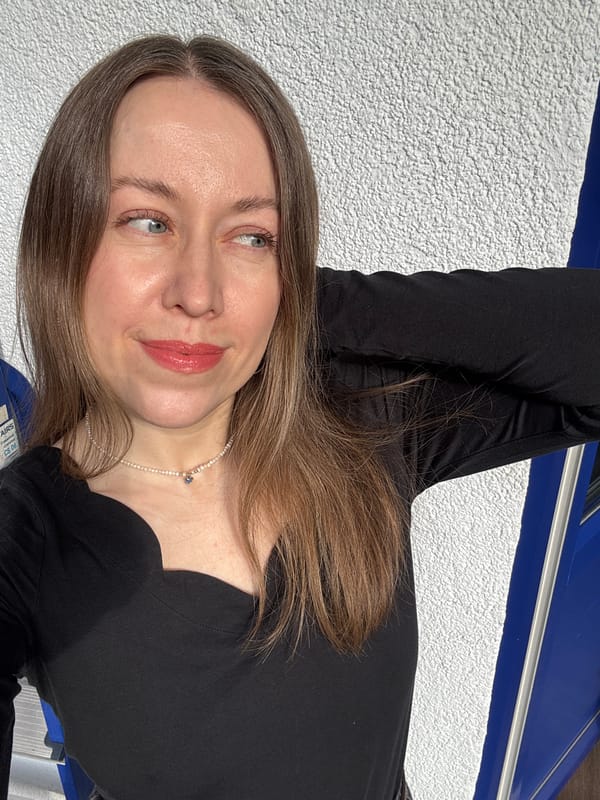 Woman photographs herself in multiple poses in Kudrovo