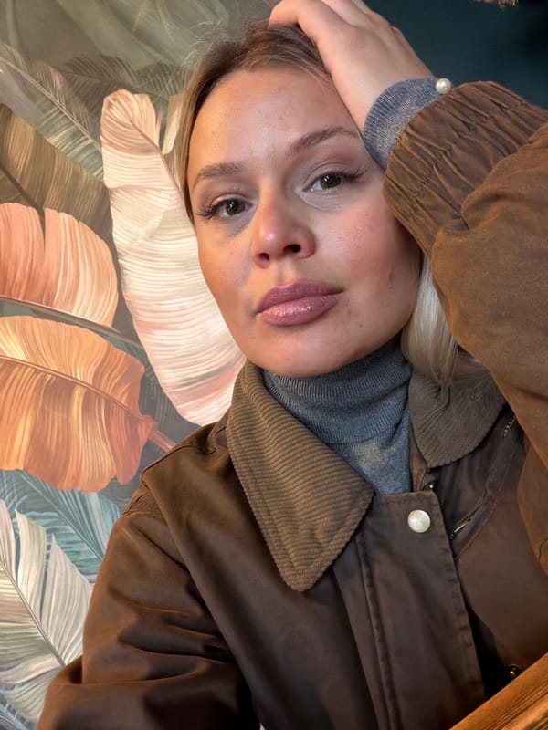 Woman takes selfie series at Sarapul pizza cafe