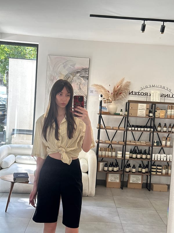 Woman takes selfies at salon in Belgrade's Vracar district