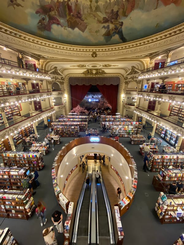 Visitors explore iconic Buenos Aires bookstore and theater venues