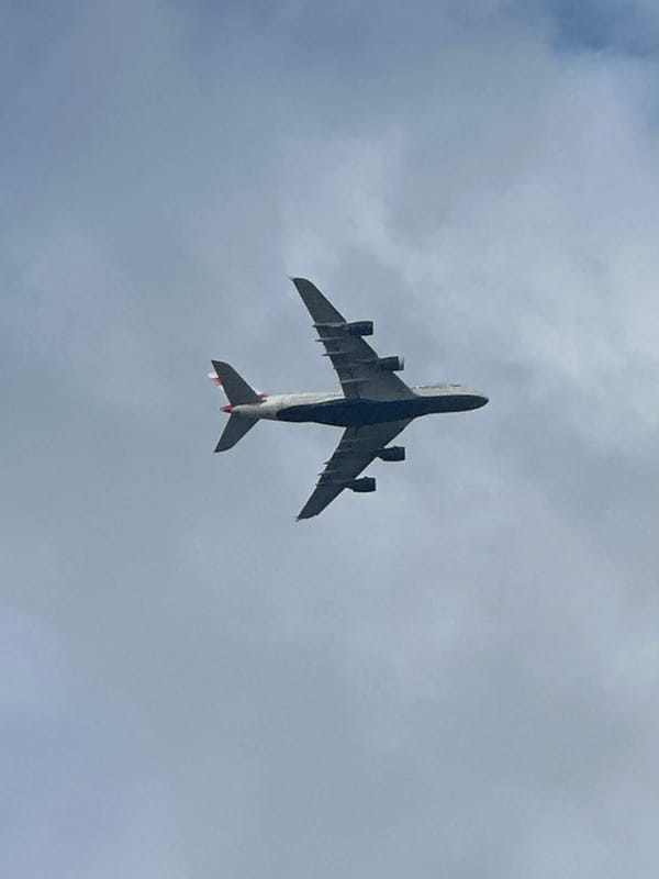 British Airways aircraft over southeast London, two angles