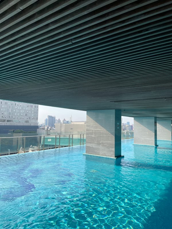 Morning pool activities documented at Jakarta rooftop facility