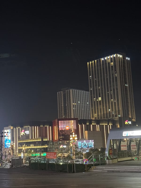 Nighttime urban photography session captures modern Liangjiang city streets