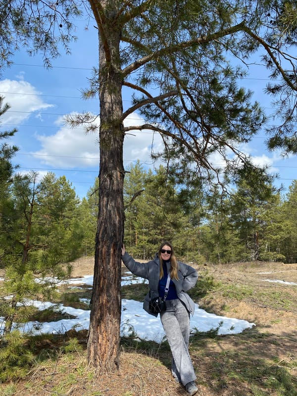 Woman documents spring forest visit in Noviy, Russia