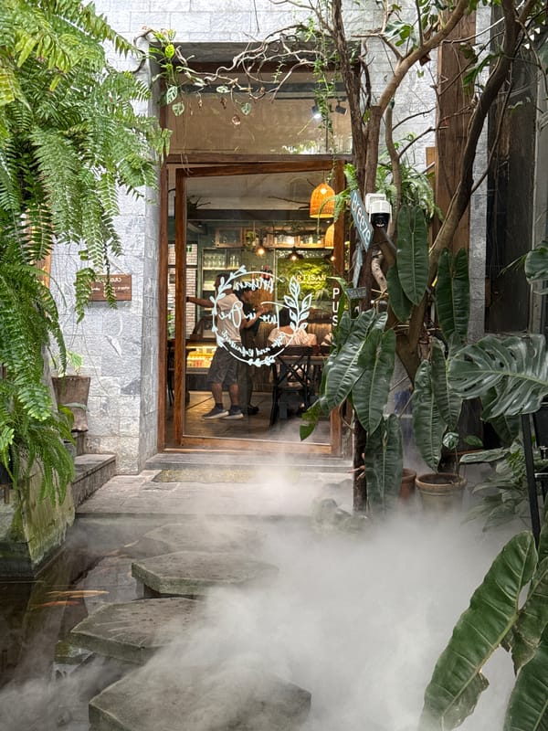 Inside a lush, koi pond cafe in Nha Trang, Vietnam