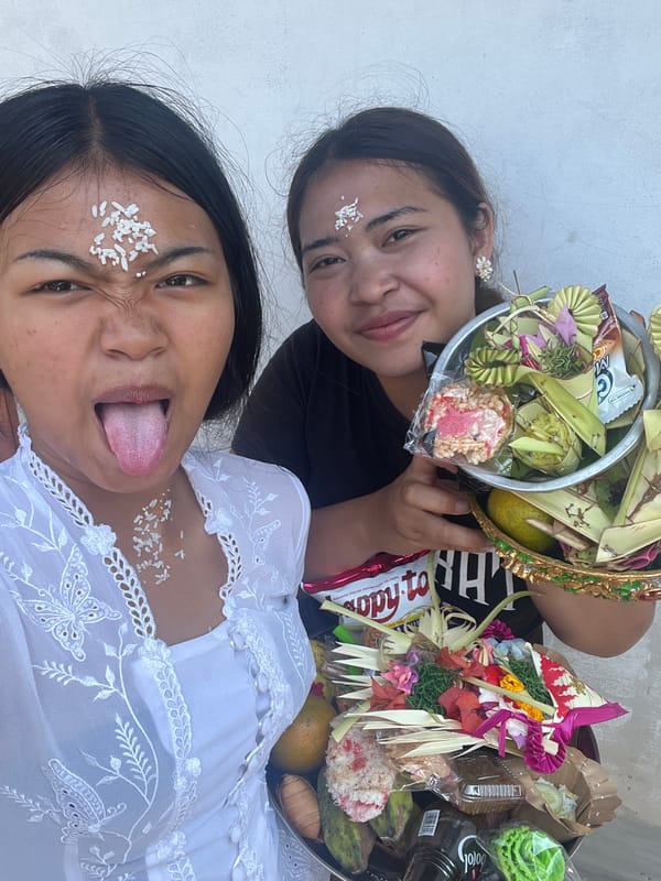 Traditional religious ceremony with offerings in Mendoyo, Bali