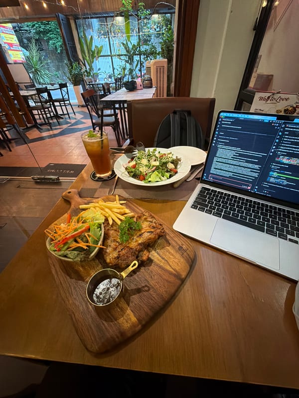 Solo diner works through rainy meal in Thủ Đức restaurant
