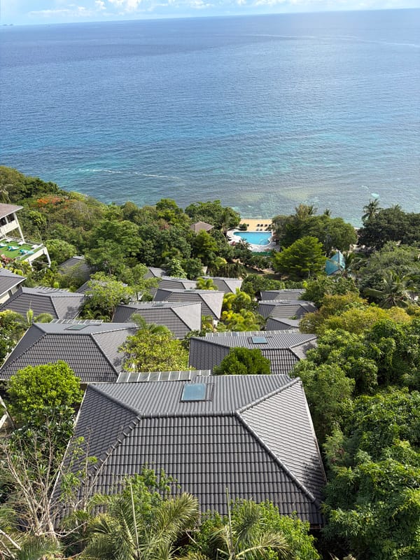 Ko Tao coastline and resort views from above and a balcony