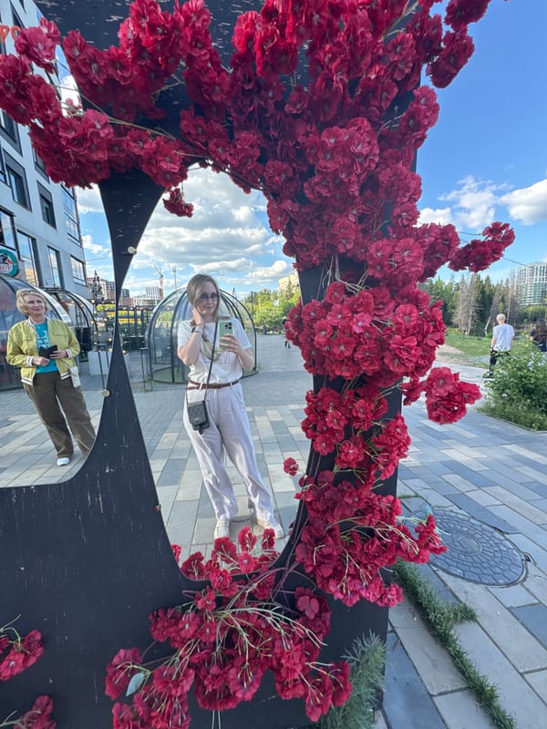 Visitors document leisure moments at Izhevsk's Garden of World park