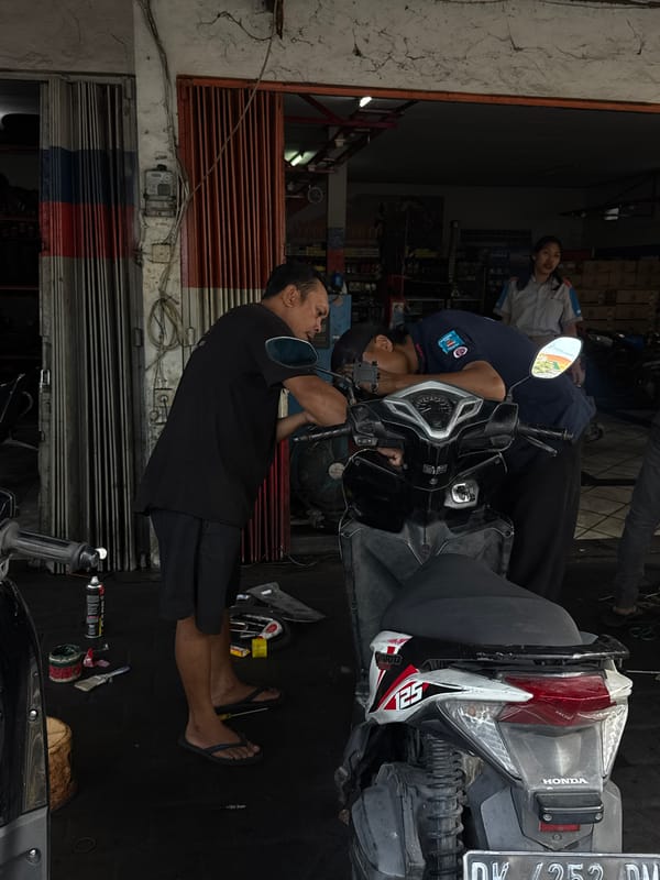 Motorcycle repair work underway in North Kuta shop