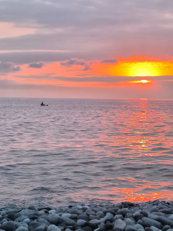 Black Sea sunset from Batumi's pebble beach