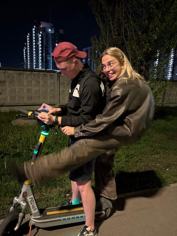 Couple shares electric scooter ride on Krasnoyarsk streets