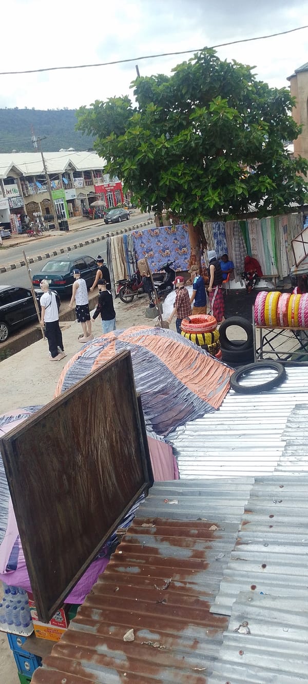 Daily life documented across Lokoja, Nigeria streets and classrooms