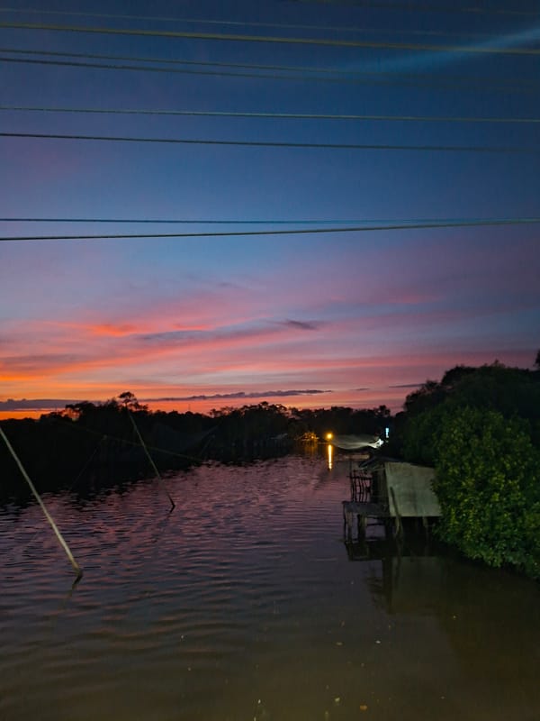 Dramatic sunset captured along Lhokseumawe waterway, Indonesia
