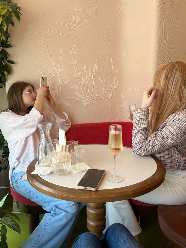 Two Women Share Champagne Brunch at Unknown Cafe