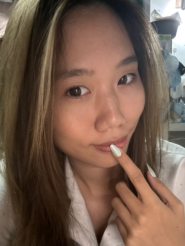 Woman takes selfies indoors in Nan'an District, China