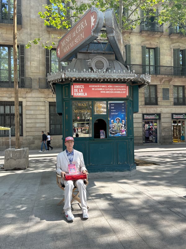 Street performers entertain tourists on Barcelona's Las Ramblas Sunday morning