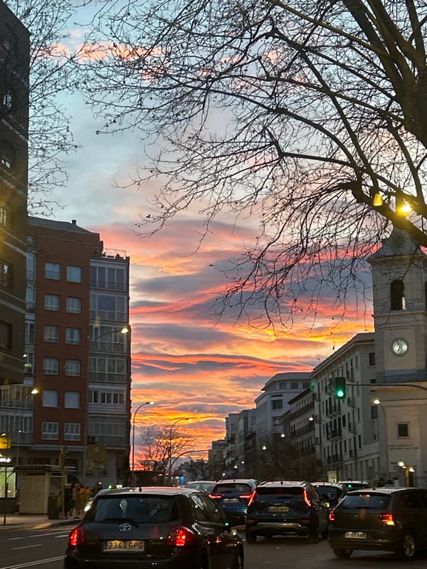 Madrid sunset documented through city streets during winter evening
