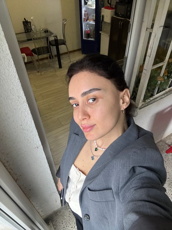 Woman photographed in multiple Tbilisi locations during morning hours