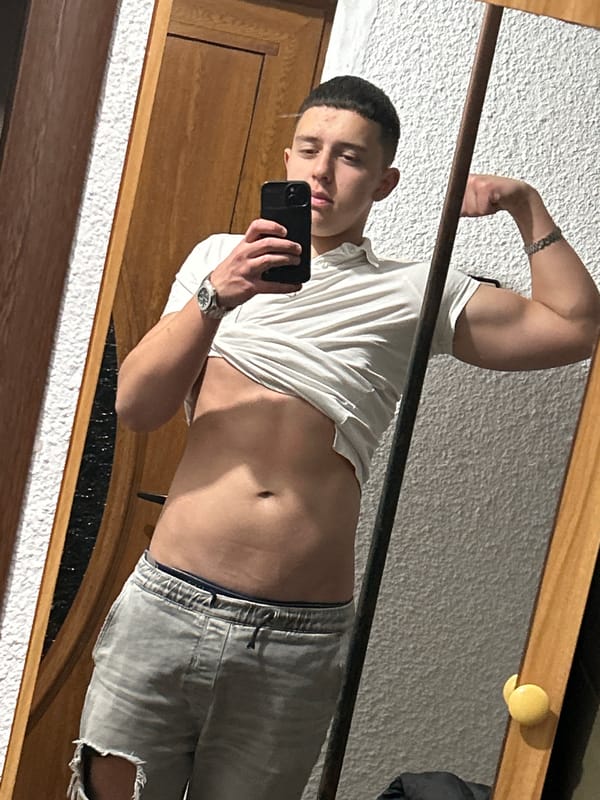 Young man takes mirror selfies in Zlatograd apartment