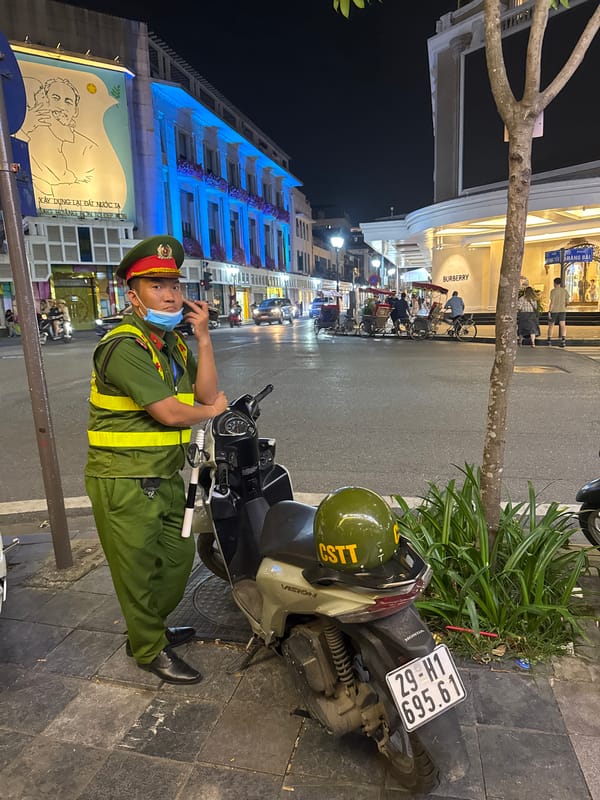 Trang Tien Plaza area glowing on a Hanoi night