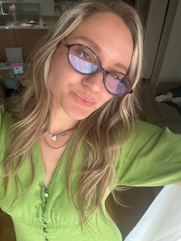 Woman takes selfies around Esenyurt in green dress