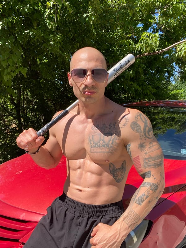 Tattooed man with baseball bat spotted near car in Pleven