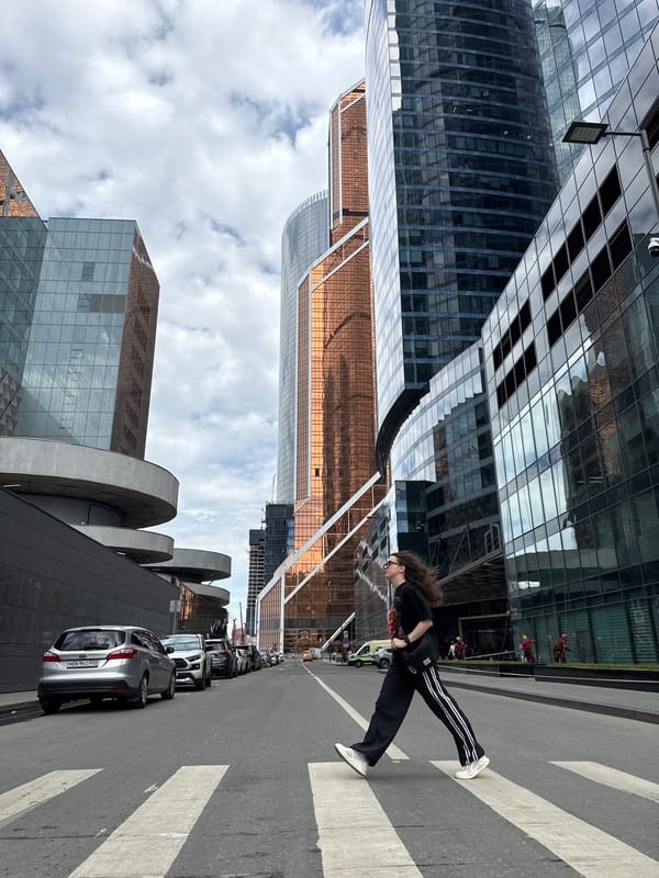 Woman on crosswalk, Lamborghini nearby in Khimki