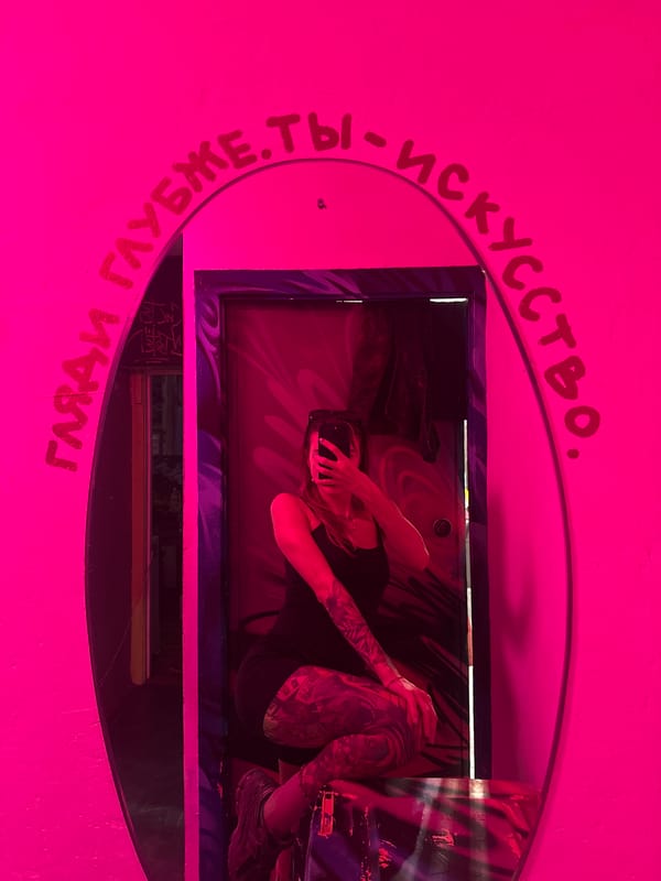 Person documents personal moments in artistic Moscow interior space