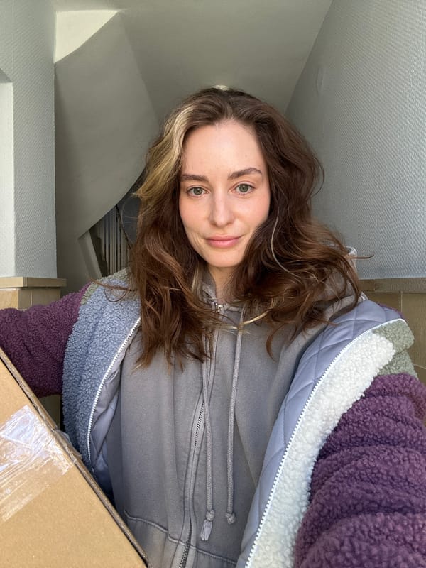 Woman records selfies indoors in Kiel, Germany